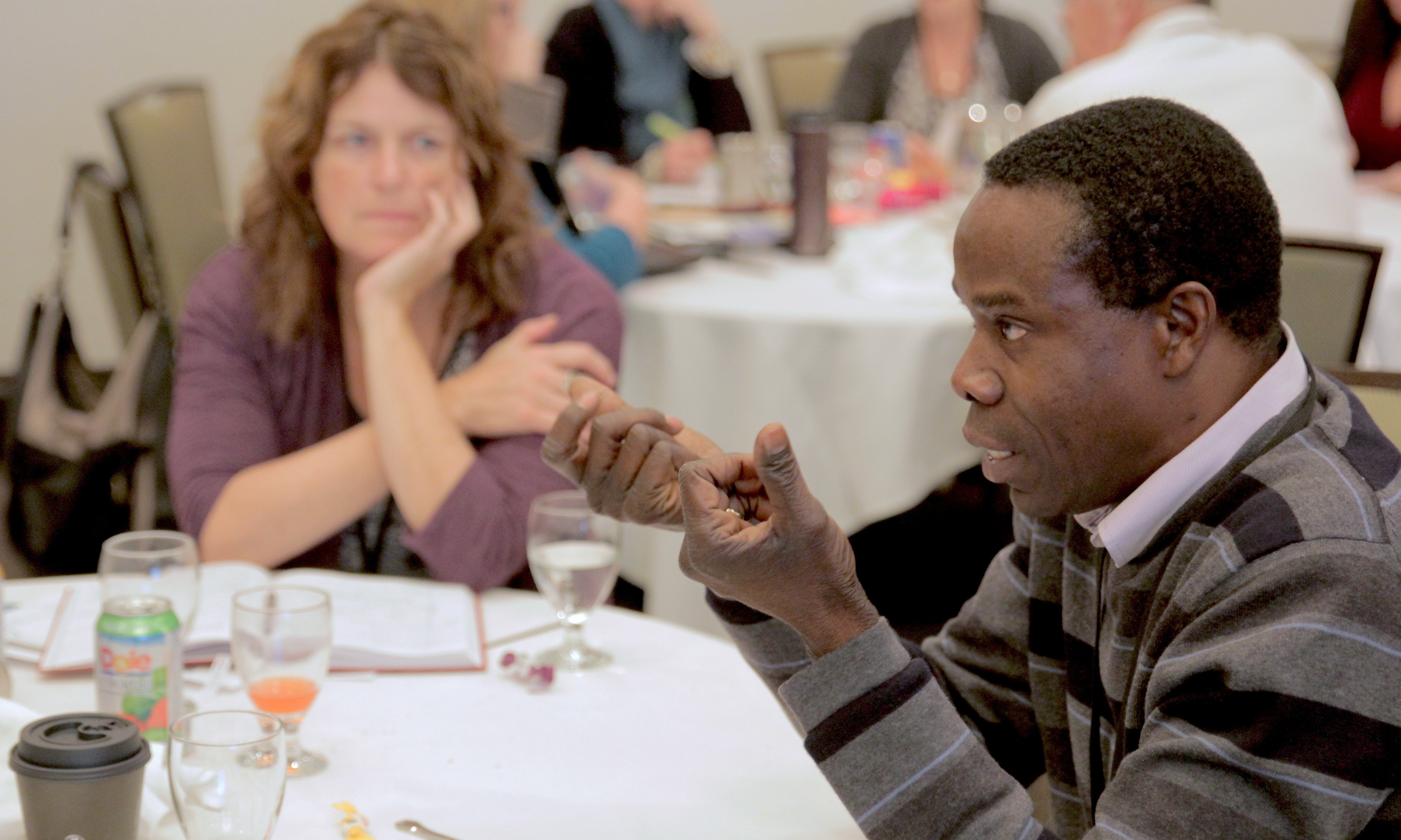 People discussing at round table