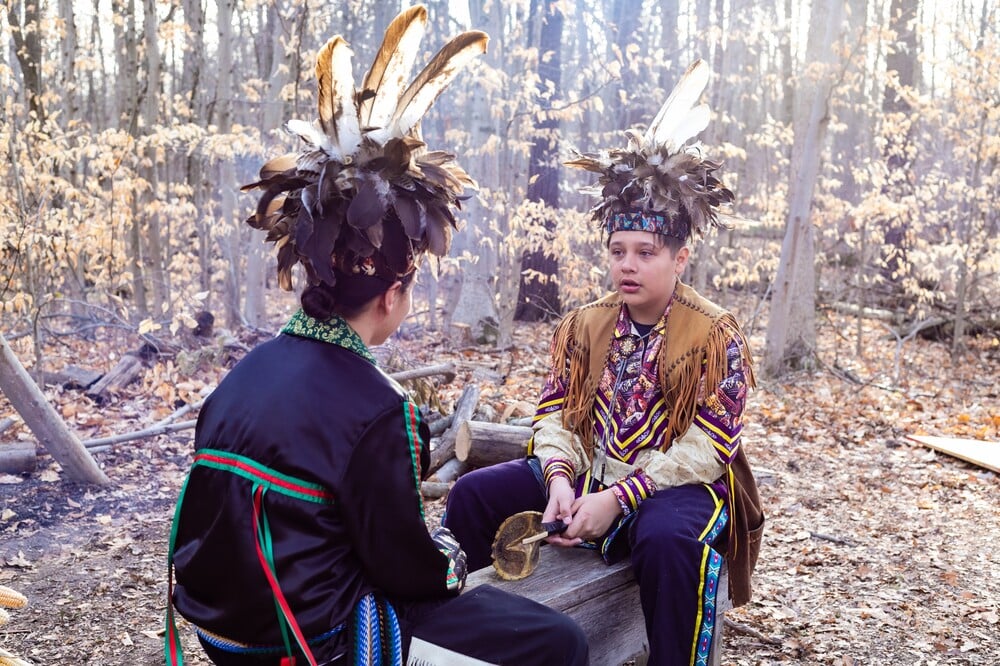 two young-people wearing-traditional-indigenous-clothing
