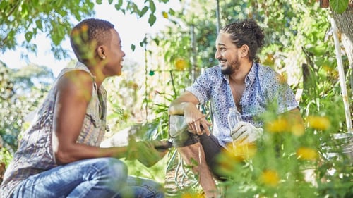 People smiling surrounded by nature