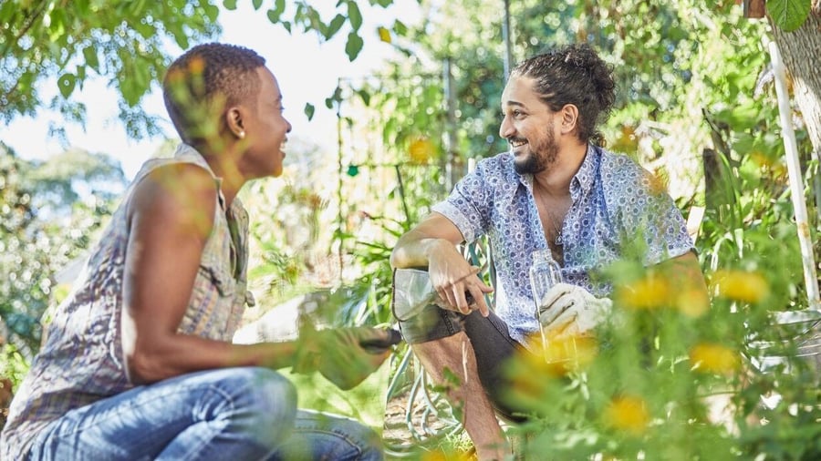 People smiling surrounded by nature