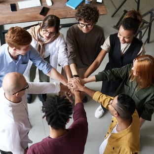 photo-of-people-holding-each-other-s-hands-3184436