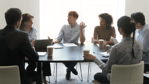 A group of people resolving conflict