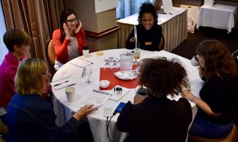 CCI Vancouver People talking around table 5 3.jpg
