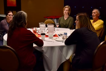 People talking at table.png