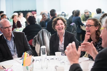 People talking at event