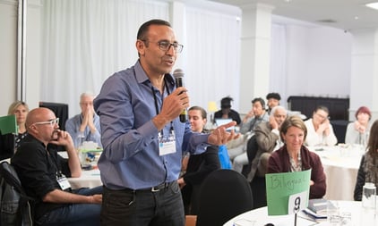 Man speaking at gathering