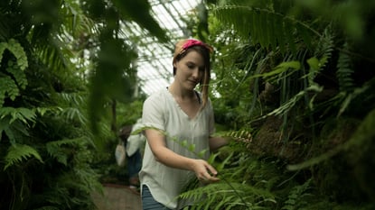 girl in greenhouse