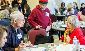 People engaging at table