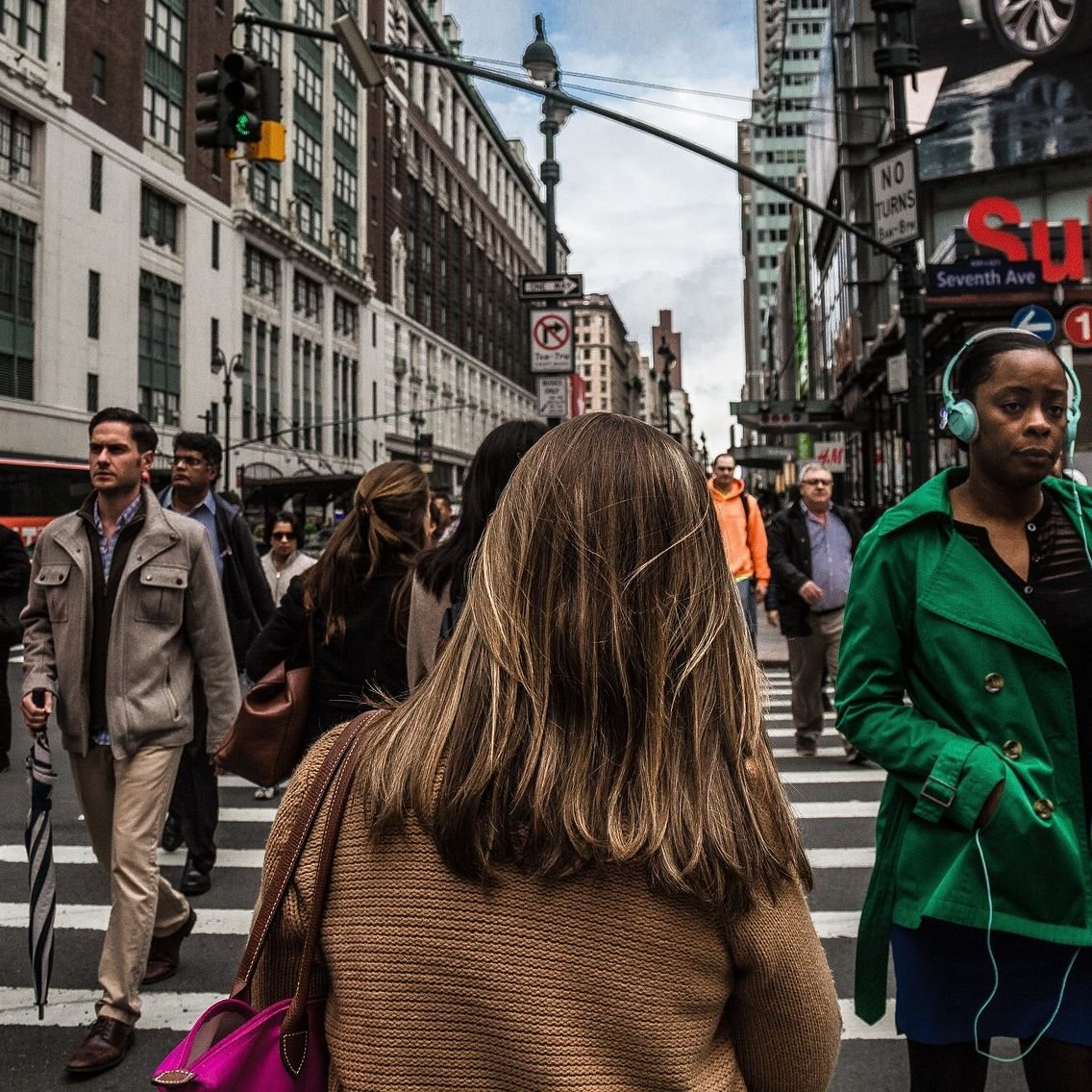 Woman Walking on Street Square