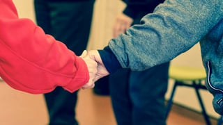 hand holding together friendship bond.jpeg