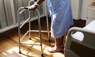 patient in hospital using walker-836272-edited