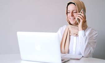 woman-in-white-hijab-using-macbook