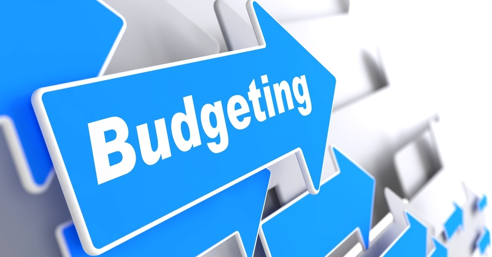Budgeting - Business Concept. Blue Arrow with "Budgeting" Slogan on a Grey Background. 3D Render..jpeg