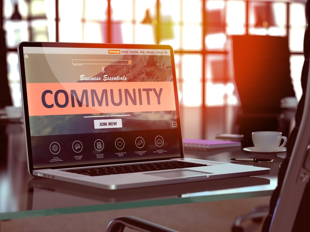 Community Concept Closeup on Laptop Screen in Modern Office Workplace. Toned Image with Selective Focus. 3D Render..jpeg