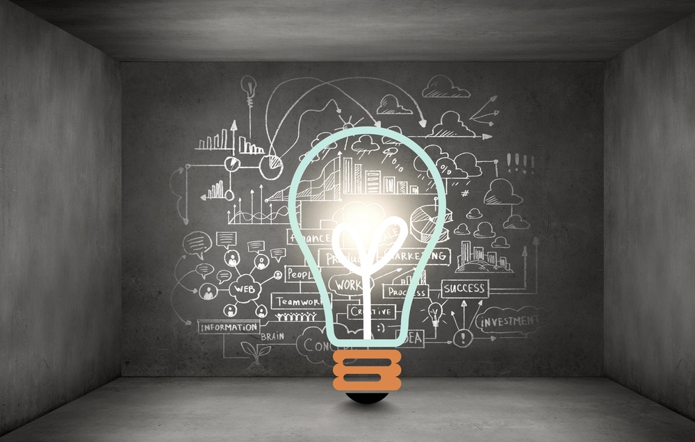 Light bulb and drawing business strategy at background.jpeg
