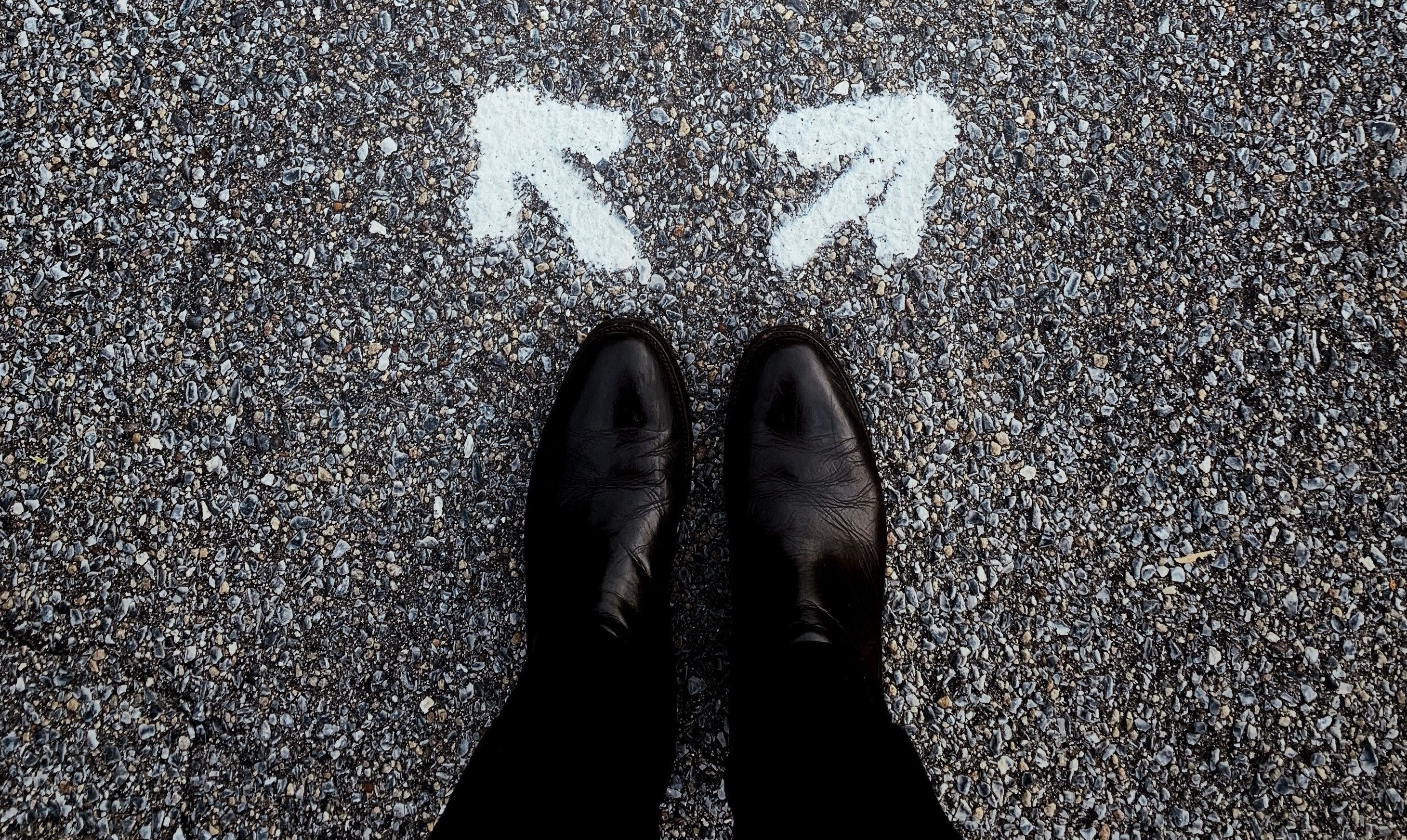 feet looking down with two arrows