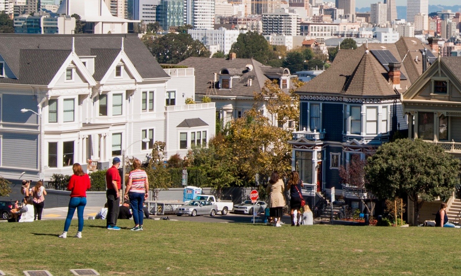 people in front of houses
