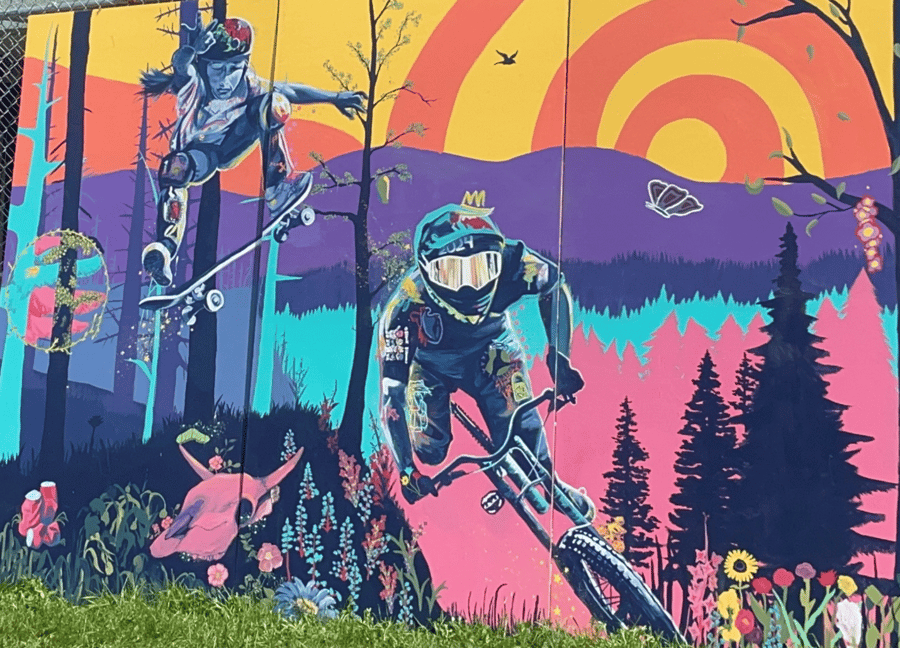 Colourful painting of individual riding bike through forest
