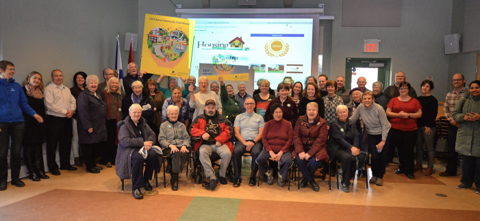 A group of people posing for a photo

Description automatically generated