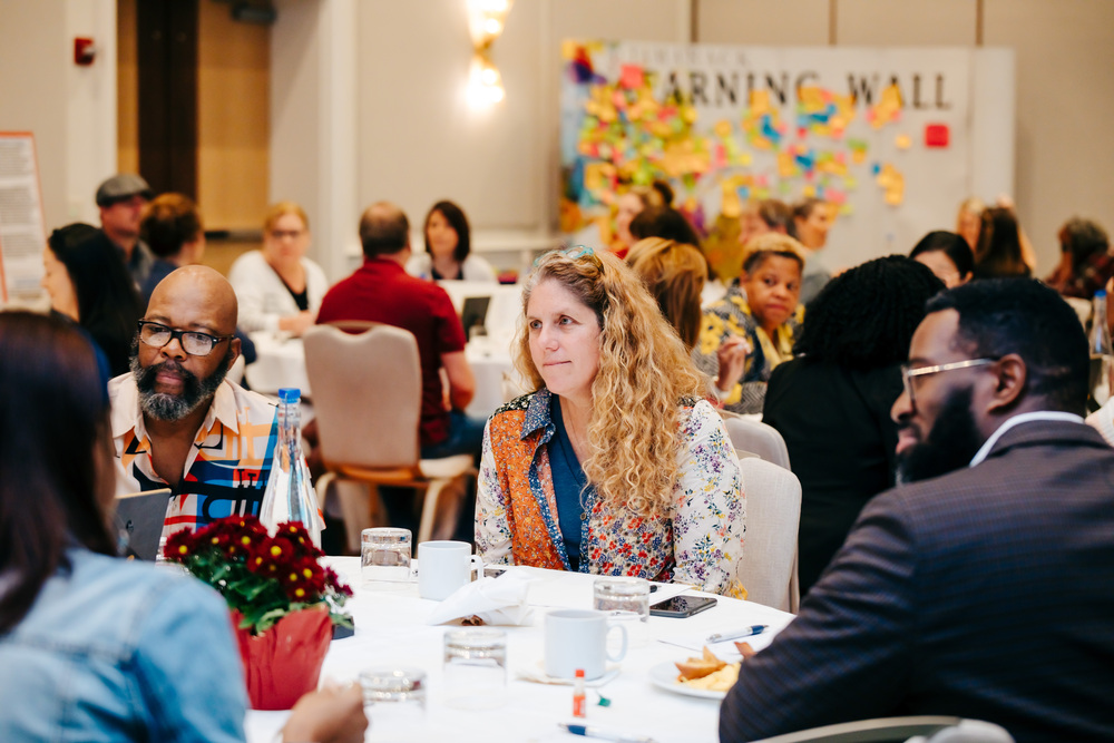 conversation-table-interaction-sharing-discussion-diverse-group