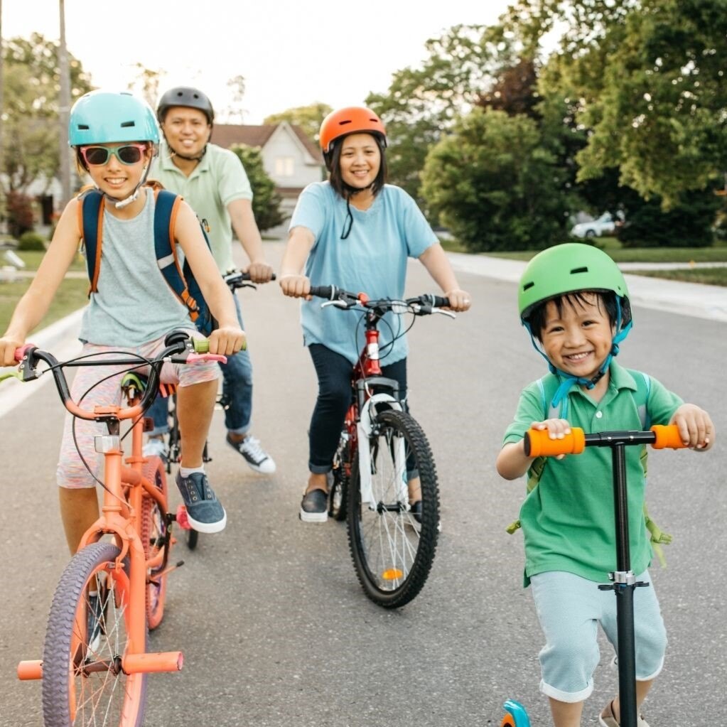 Family riding bikes