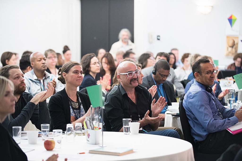 workshop participants clapping